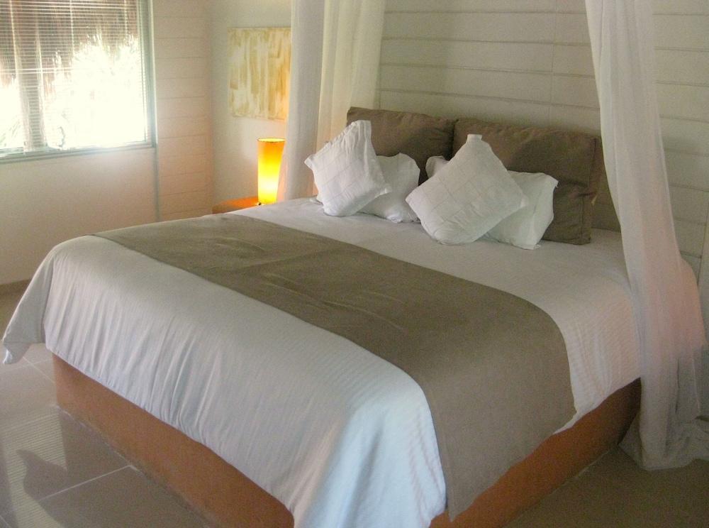 Magic Blue Spa Boutique Hotel Adults Only Playa del Carmen Exterior photo A bed with a bed runner